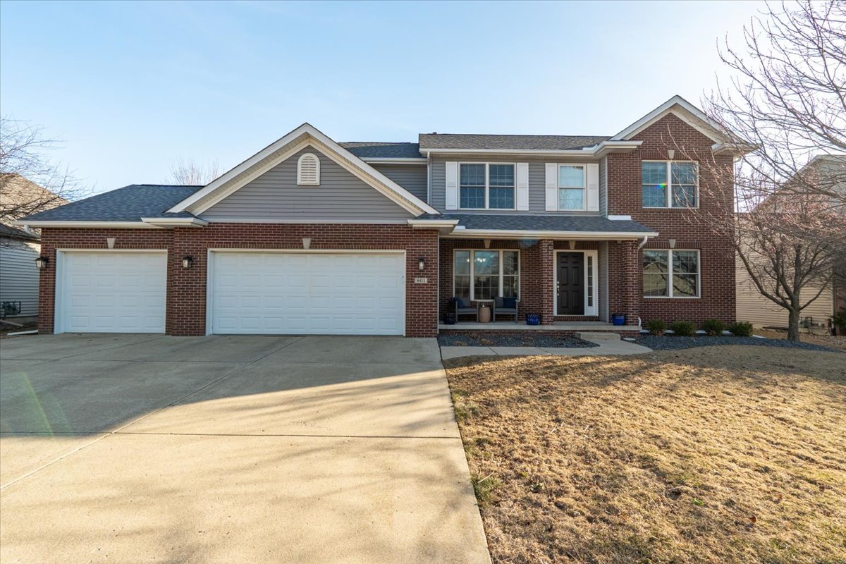 801 Balsam Road Normal, IL 61761 - Photo 1 of 56 a front view of a house with a yard and garage