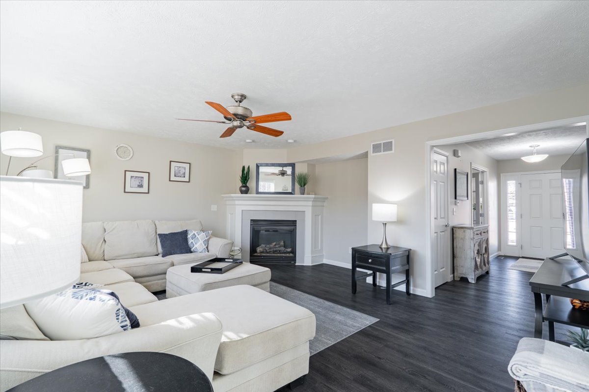 801 Balsam Road Normal, IL 61761 - Photo 11 of 56 a living room with furniture and a fireplace