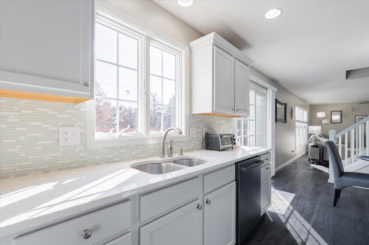 801 Balsam Road Normal, IL 61761 - Photo 16 of 56 a kitchen with a sink and a window