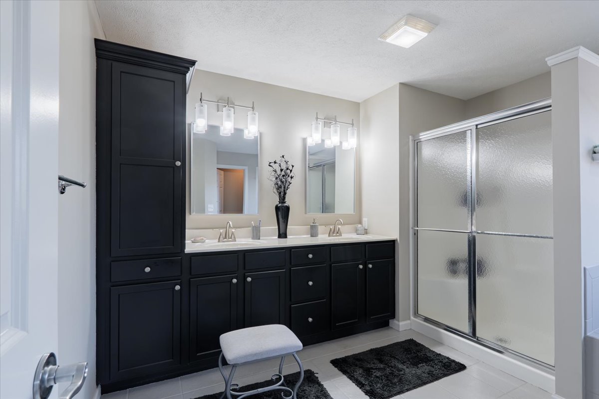 801 Balsam Road Normal, IL 61761 - Photo 22 of 56 a bathroom with a sink and a mirror