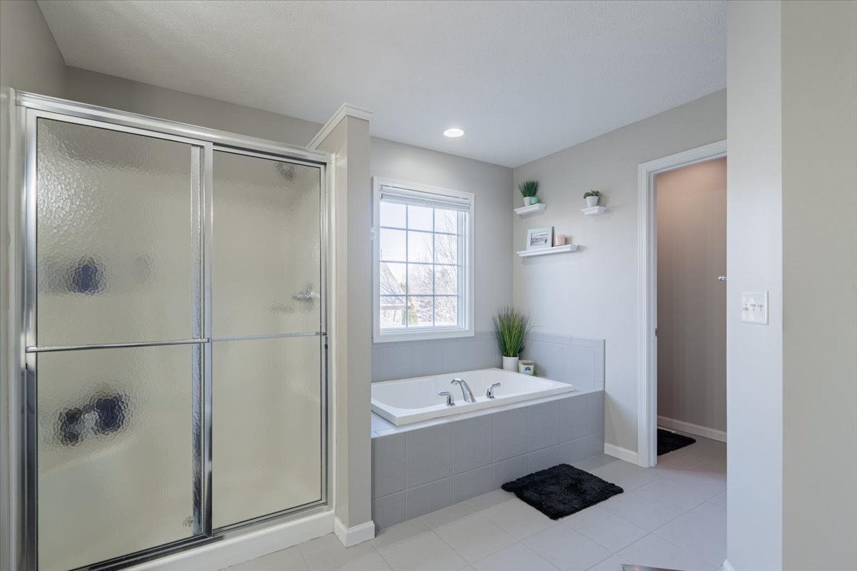 801 Balsam Road Normal, IL 61761 - Photo 23 of 56 a bathroom with a bathtub and shower
