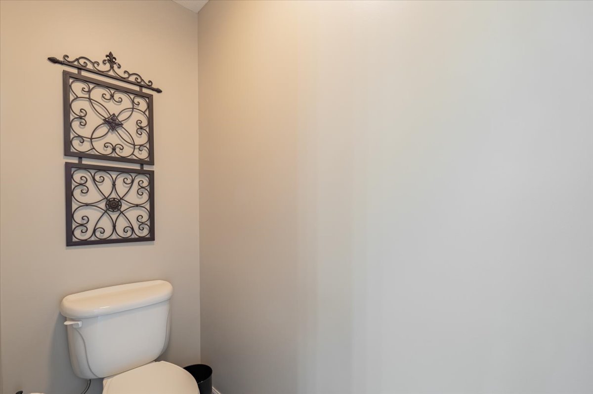 801 Balsam Road Normal, IL 61761 - Photo 24 of 56 a white toilet sitting next to a white walls
