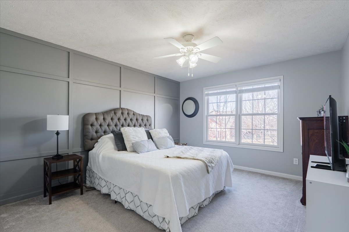 801 Balsam Road Normal, IL 61761 - Photo 28 of 56 a bedroom with bed tv and window