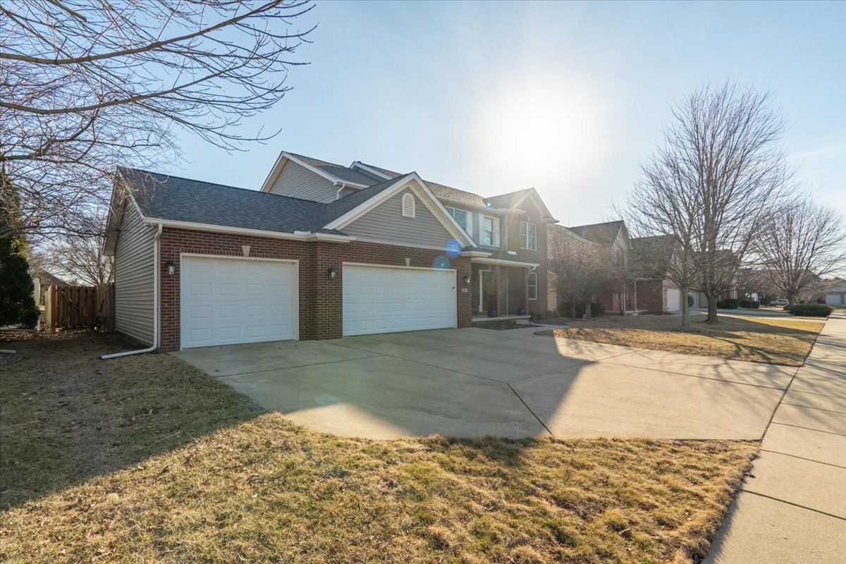 801 Balsam Road Normal, IL 61761 - Photo 3 of 56 a view of a house with a yard and garage