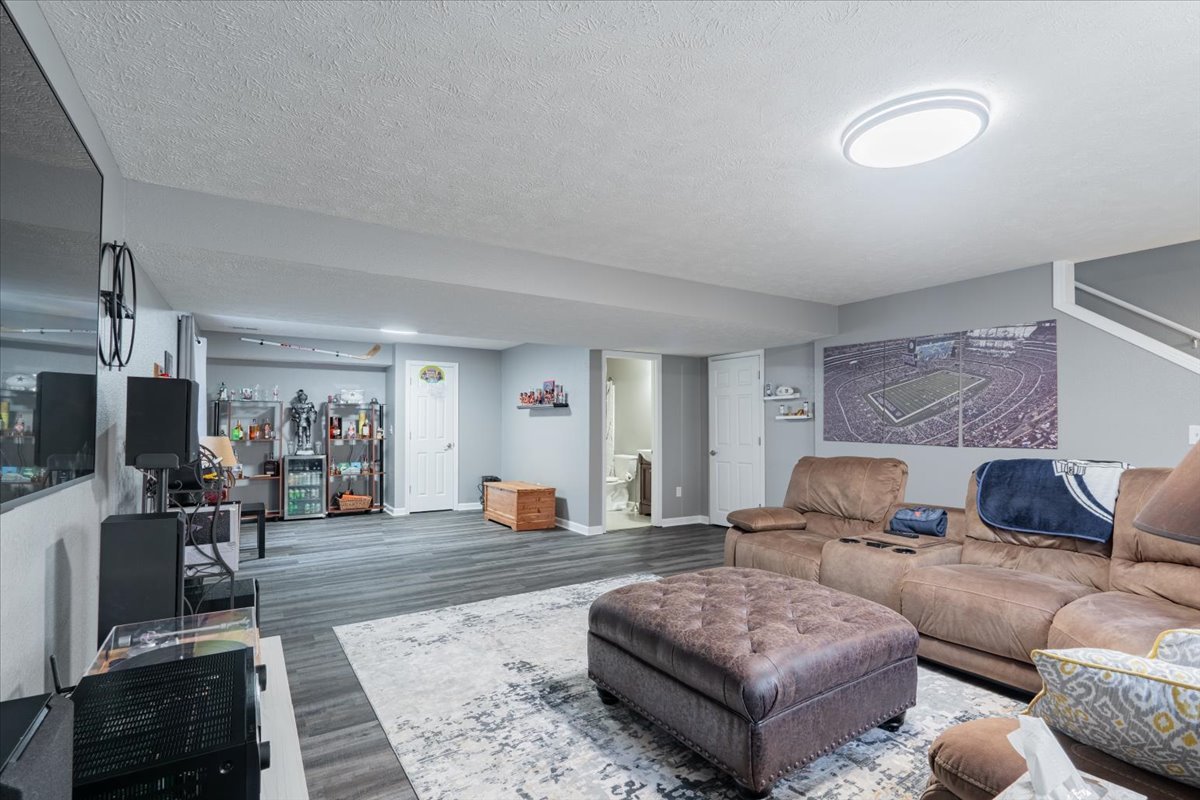 801 Balsam Road Normal, IL 61761 - Photo 35 of 56 a living room with furniture and wooden floor