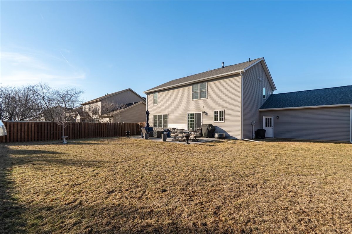 801 Balsam Road Normal, IL 61761 - Photo 40 of 56 a house with a yard