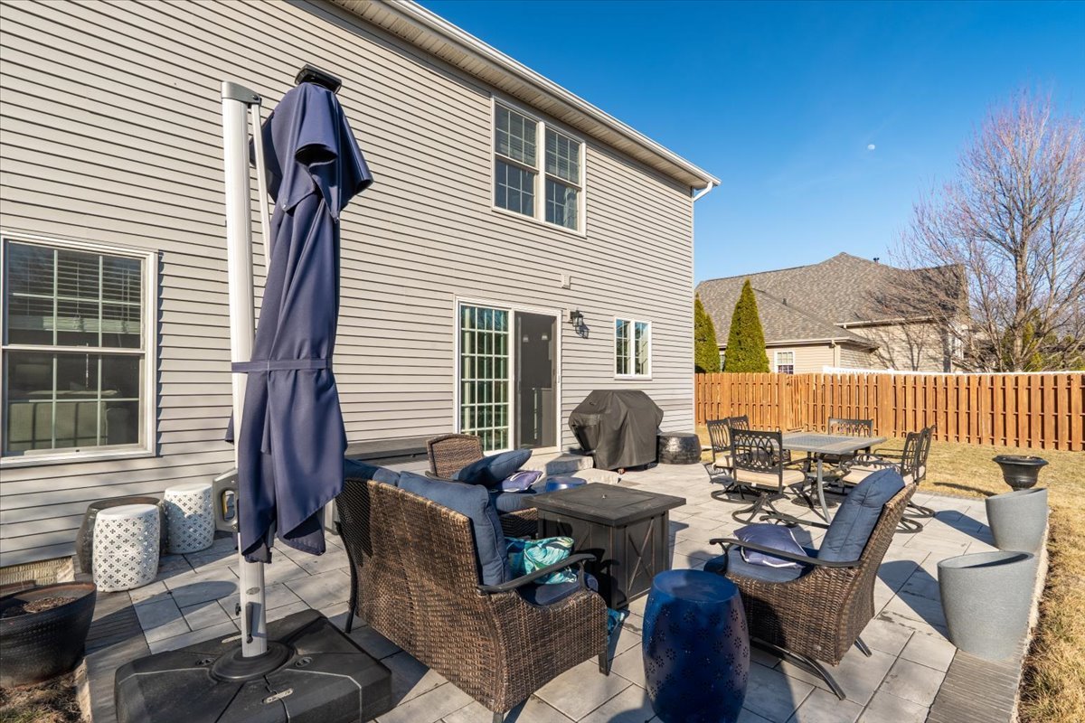 801 Balsam Road Normal, IL 61761 - Photo 44 of 56 a view of a patio with couple of chairs and potted plants