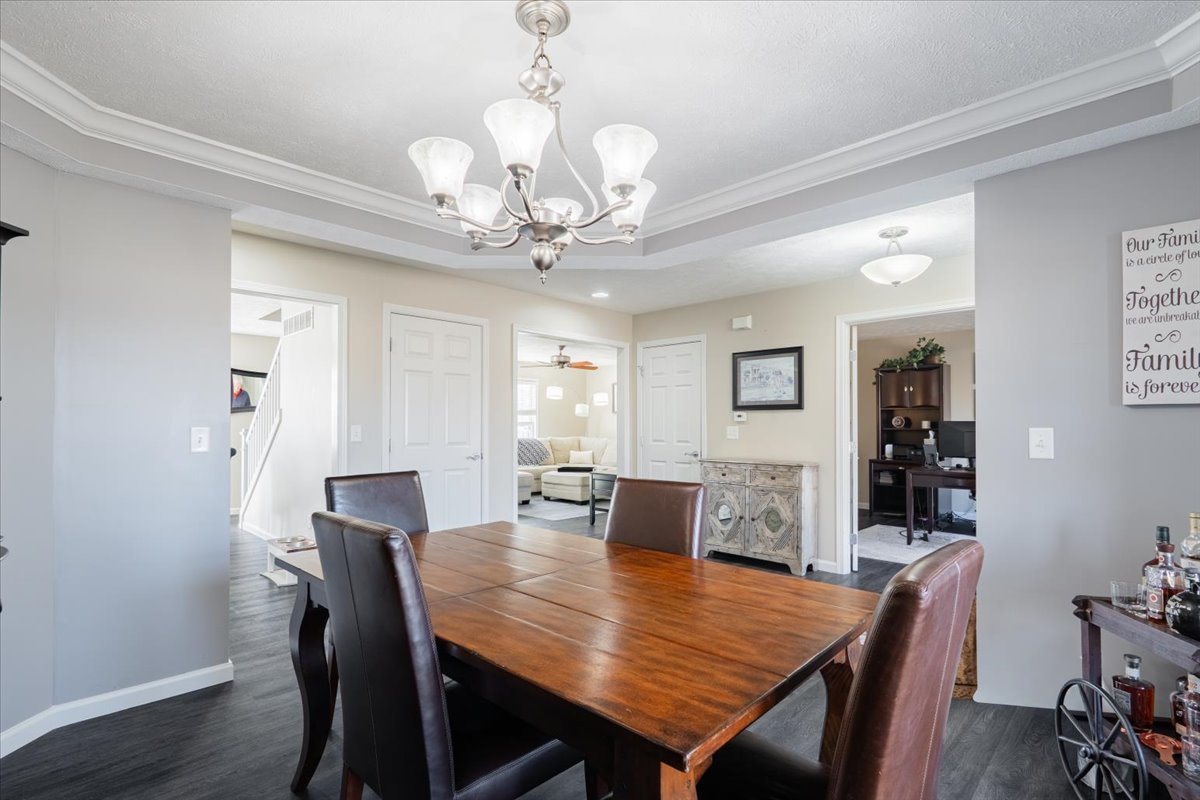 801 Balsam Road Normal, IL 61761 - Photo 6 of 56 a view of a dining room with furniture window and wooden floor
