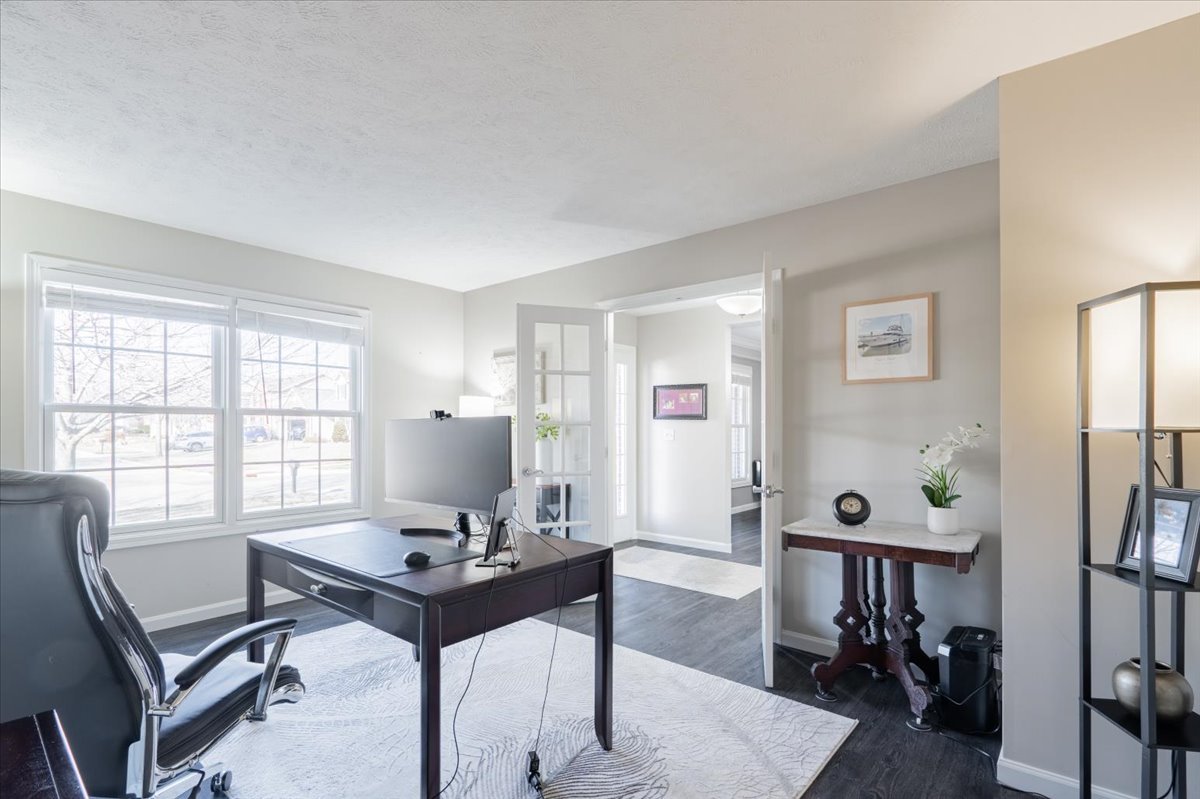 801 Balsam Road Normal, IL 61761 - Photo 7 of 56 a view of a workspace with furniture and a window