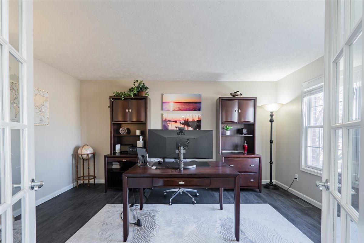 801 Balsam Road Normal, IL 61761 - Photo 8 of 56 a view of a workspace with furniture and a window