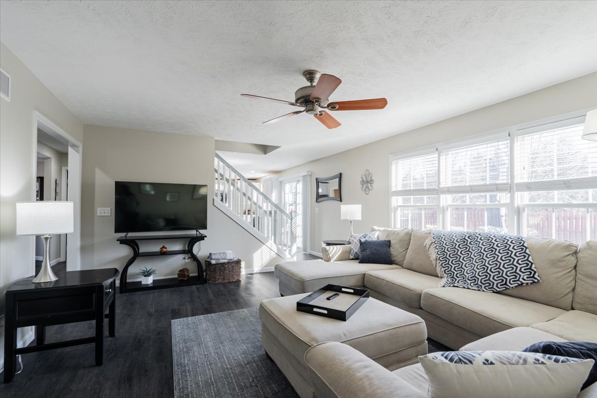801 Balsam Road Normal, IL 61761 - Photo 10 of 56 a living room with furniture and a flat screen tv