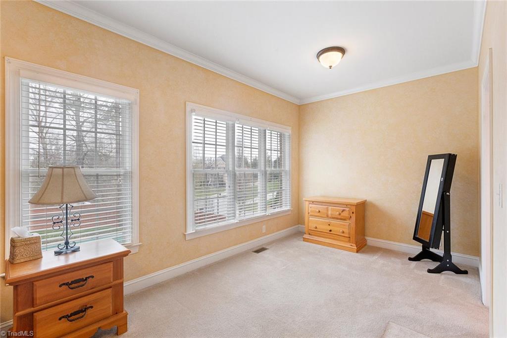 516 Beech Ridge Road Thomasville, NC 27360 - Photo 13 of 30 The master bedroom has the prefect sitting room area.