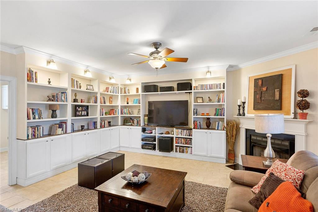 516 Beech Ridge Road Thomasville, NC 27360 - Photo 22 of 30 Love the custom built-ins and gas log fireplace.