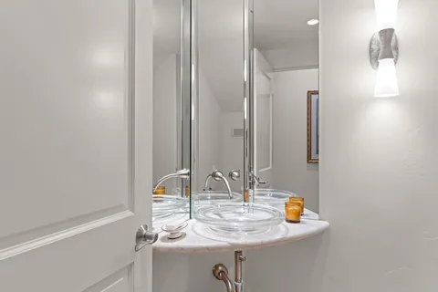 a workspace with furniture and a wooden floor