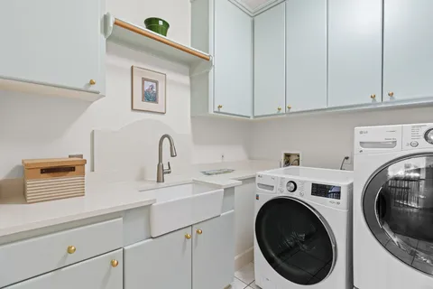 a view of a swimming pool with outdoor seating