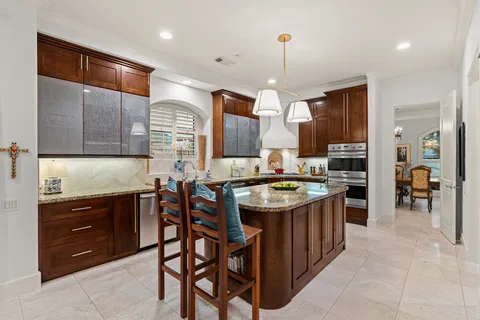 a living room with furniture fireplace and book shelf