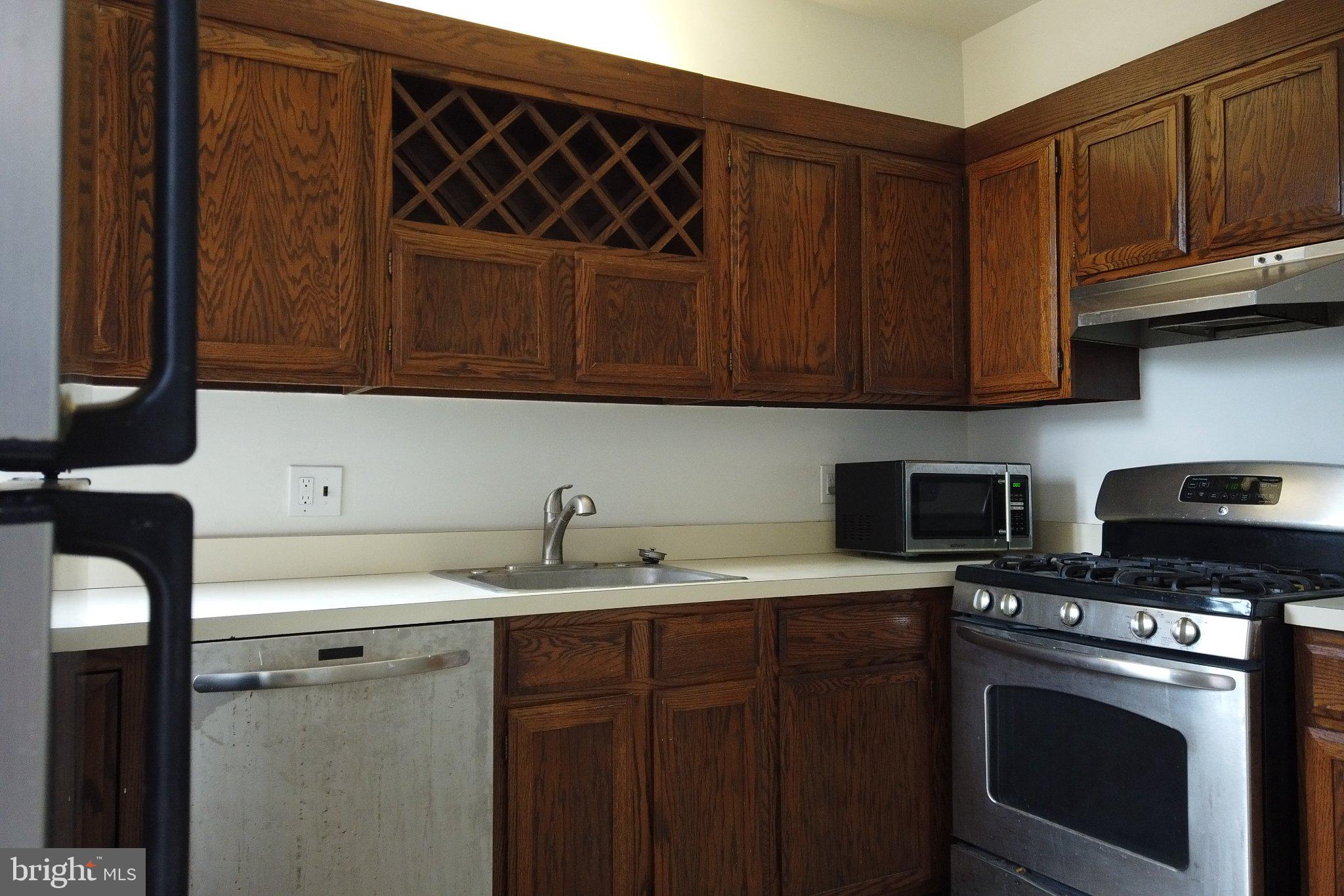 604 9th Street Northeast Washington, DC 20002 - Photo 4 of 28 Warm wood tones in a cozy kitchen.