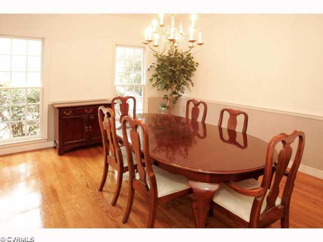 9720 Coalboro Road Chesterfield, VA 23838 - Photo 4 of 12 Dining Room - Formal dining room has hardwoods, chair & crown moldings! Lovely chandelier! French doors aren't pictured, but are a great addition to the room!