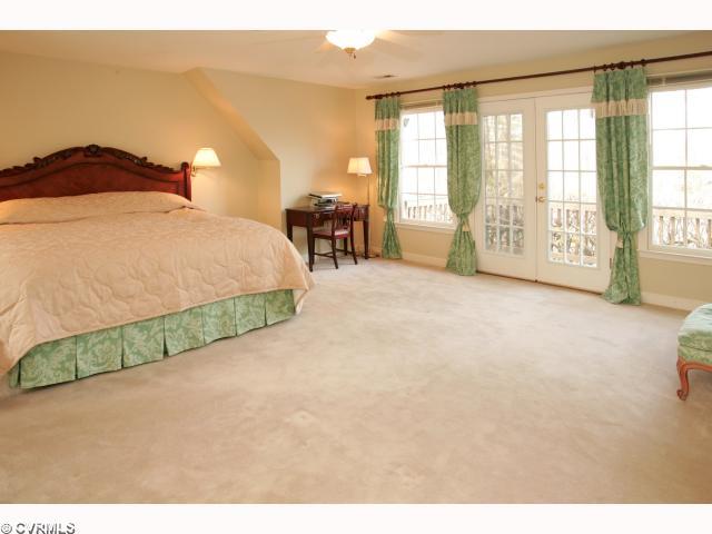 9720 Coalboro Road Chesterfield, VA 23838 - Photo 6 of 12 Master Bedroom - Master has a neutral walls and carpet! Ceiling fan with light! French doors lead to the private balcony! Walk-in closet! (not pictured)