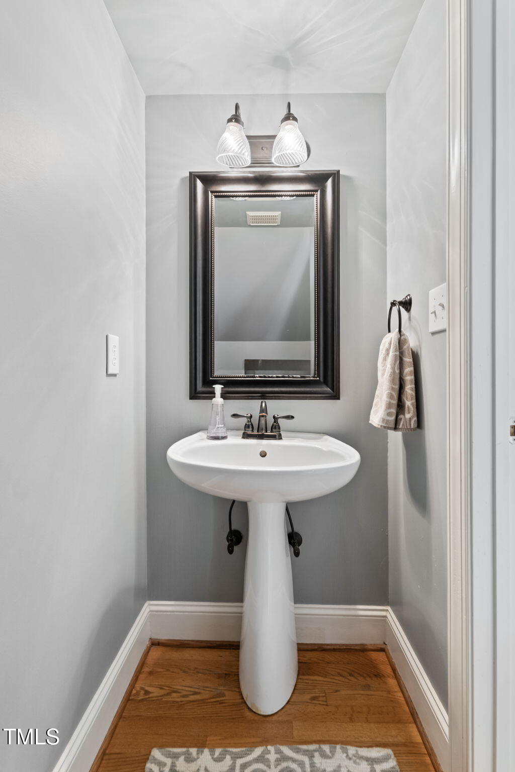4513 Touchstone Forest Road Raleigh, NC 27612 - Photo 75 of 79 1st floor Half Bathroom