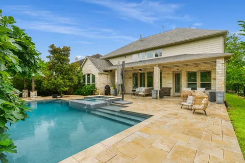$975,000 | 10 Black Spruce Court, The Woodlands, TX 77375