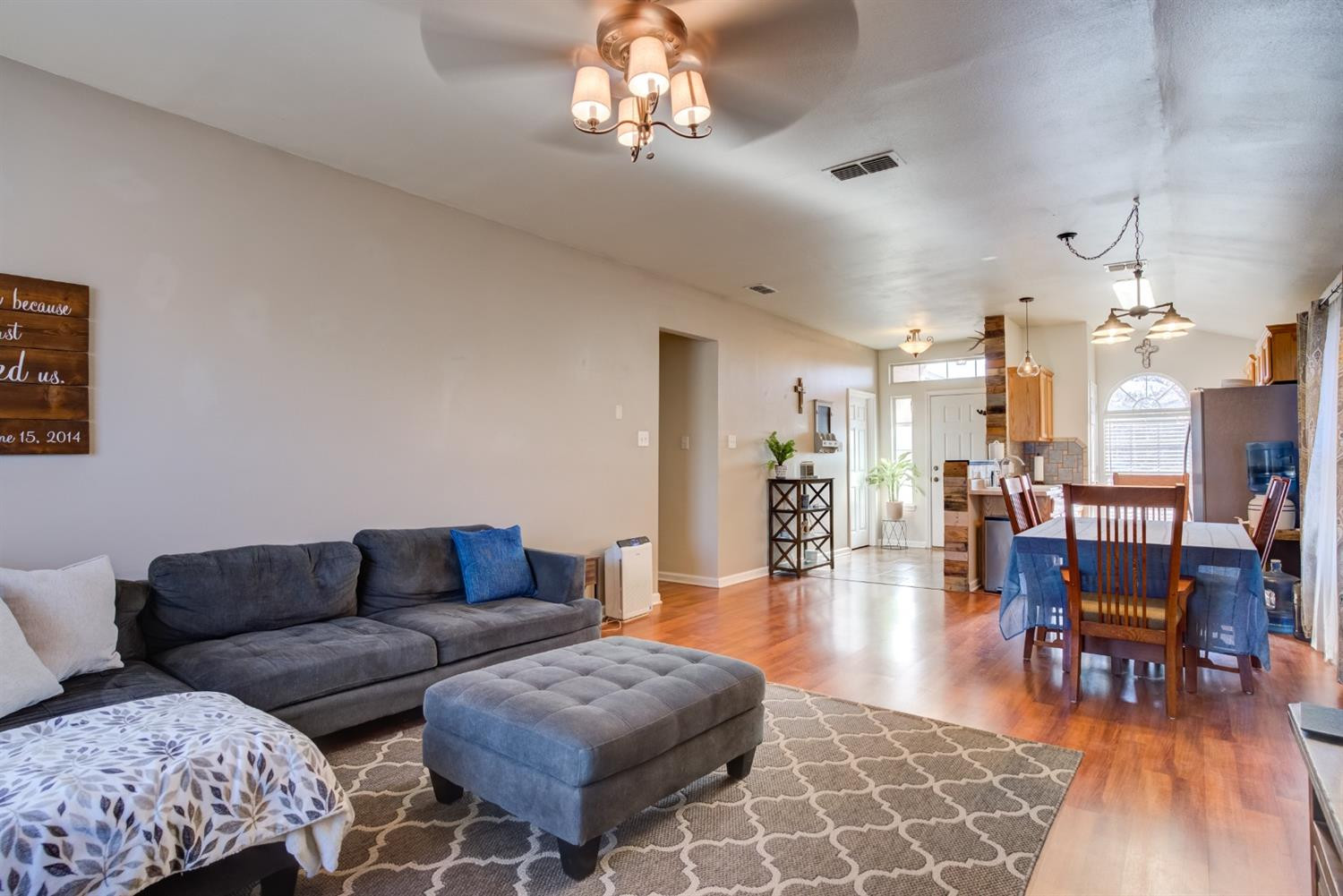 6514 86th Street Lubbock, TX 79424 - Photo 14 of 34 a living room with furniture and wooden floor