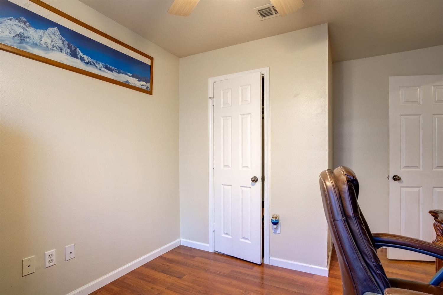 6514 86th Street Lubbock, TX 79424 - Photo 28 of 34 a view of a hallway with wooden floor