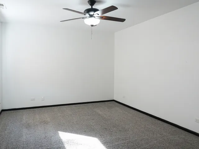 a view of a small space with a fan