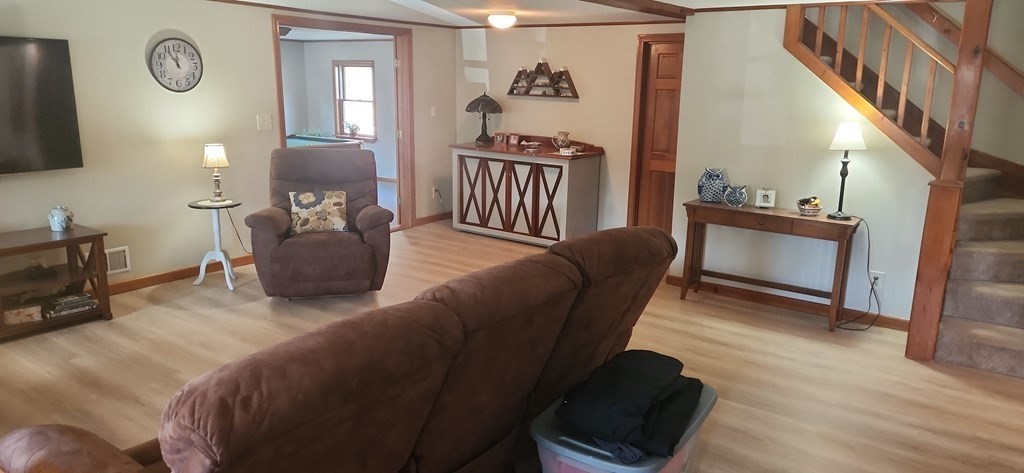 1 Mill Street Middleton, MA 01949 - Photo 19 of 30 a living room with furniture and a fireplace