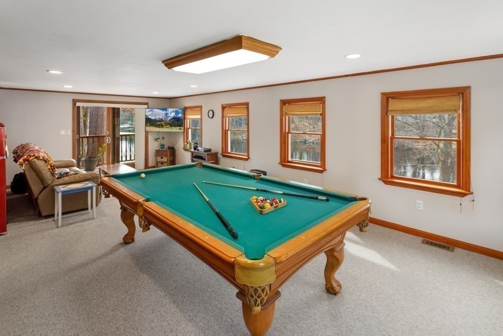 1 Mill Street Middleton, MA 01949 - Photo 21 of 30 a room with pool table and two windows