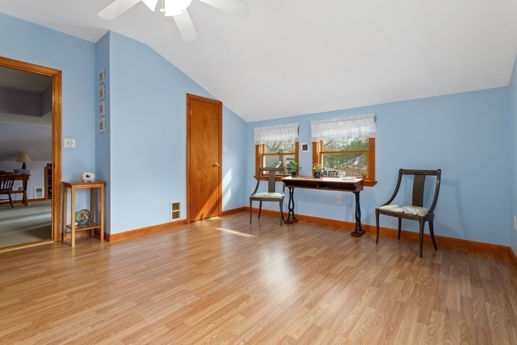 1 Mill Street Middleton, MA 01949 - Photo 26 of 30 a living room with furniture and a wooden floor