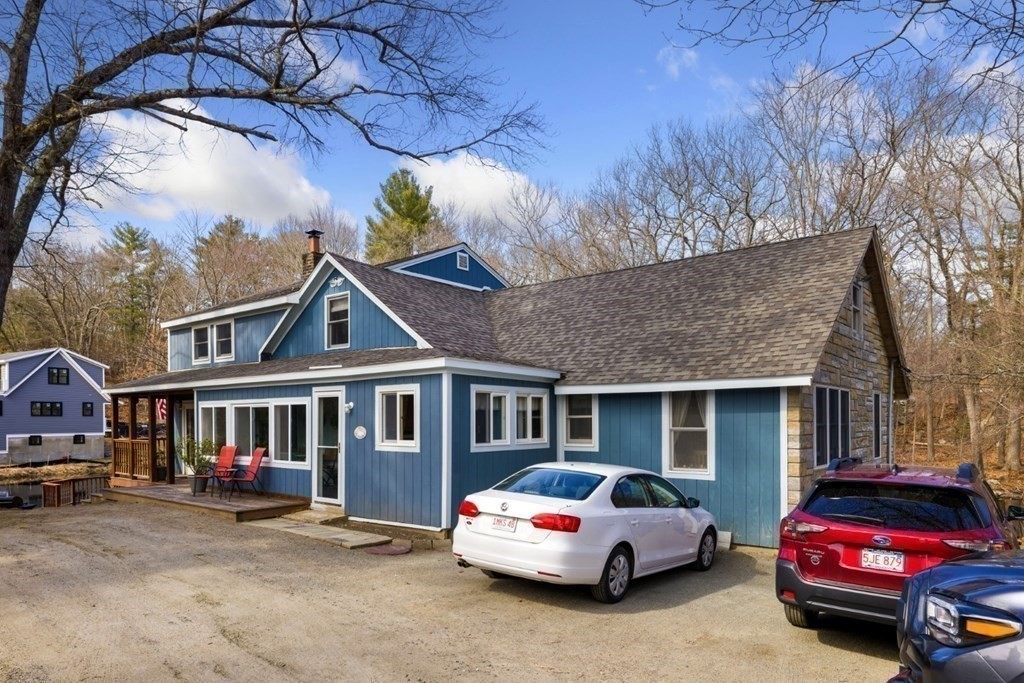 1 Mill Street Middleton, MA 01949 - Photo 6 of 30 a car parked in front of a house