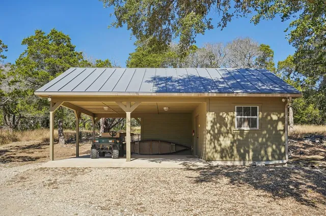 a view of a town with mountains in the background