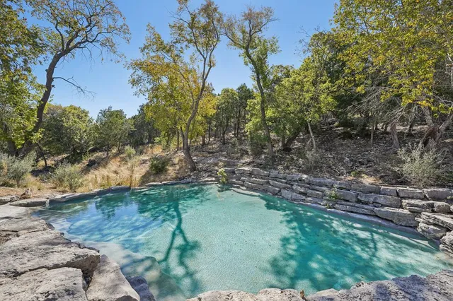 a view of a lake with mountains in the background