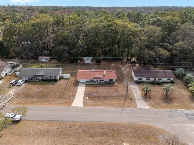a view of a swimming pool with lounge chair