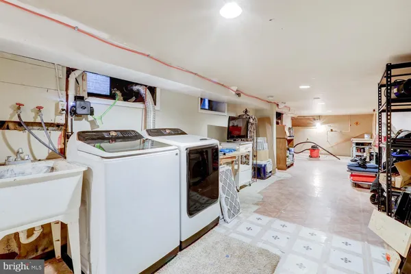a storage room with washer and dryer