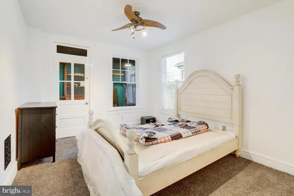 a living room with furniture and window