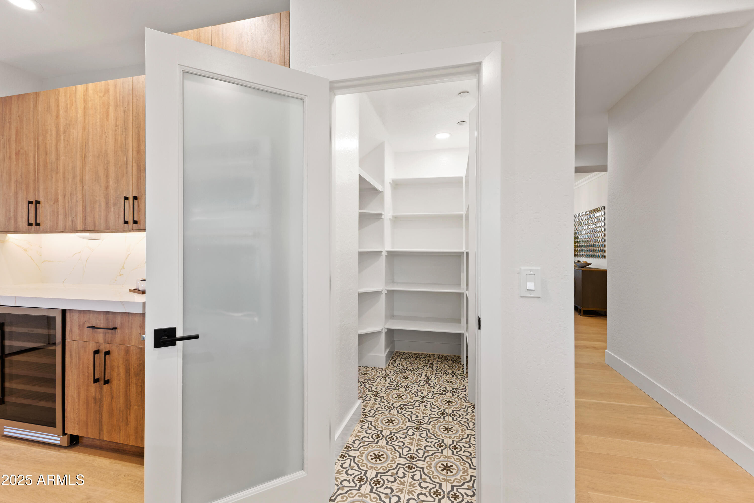 27589 North 61st Place Scottsdale, AZ 85266 - Photo 19 of 89 a view of walk in closet with empty racks