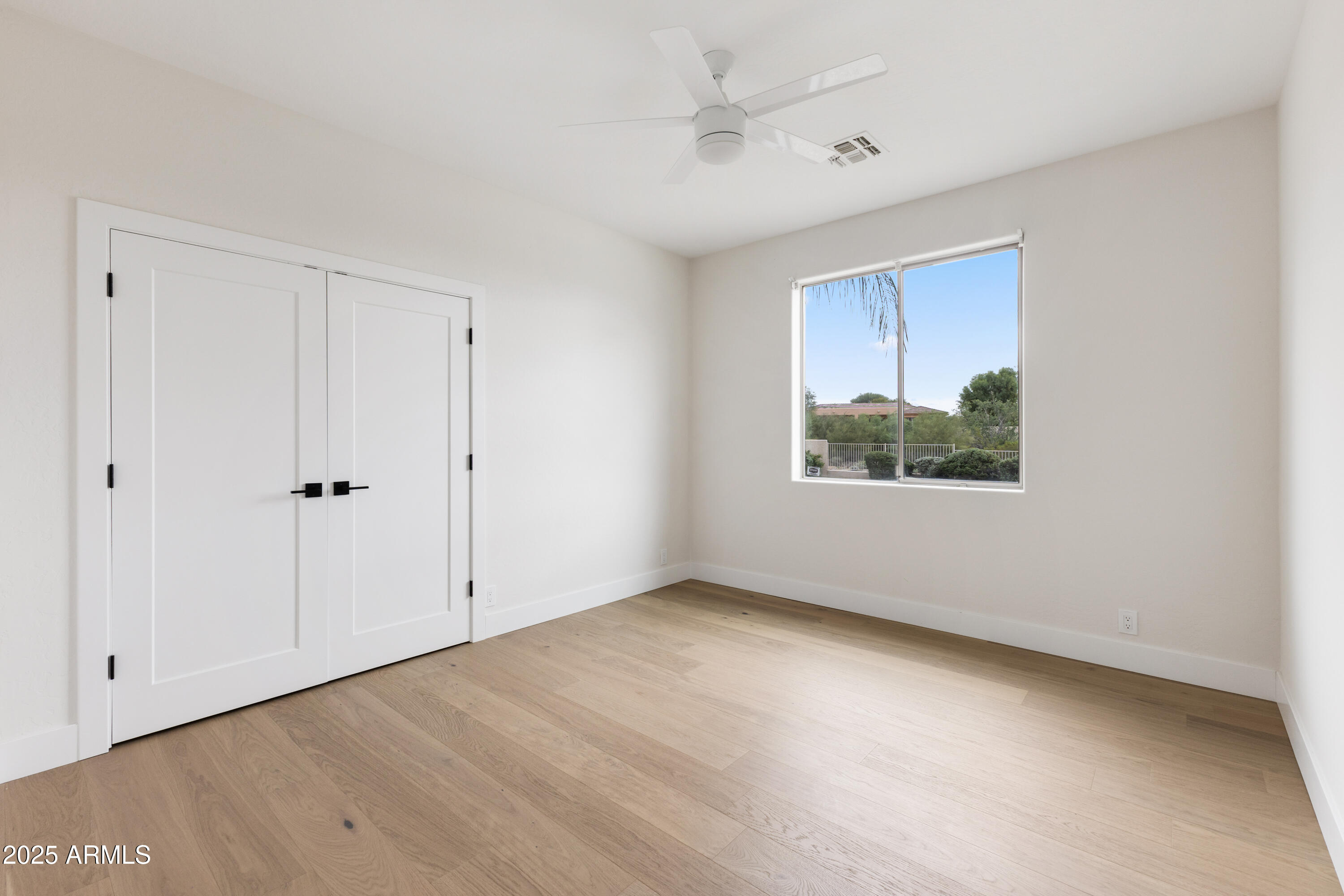 27589 North 61st Place Scottsdale, AZ 85266 - Photo 60 of 89 a view of an empty room with a window