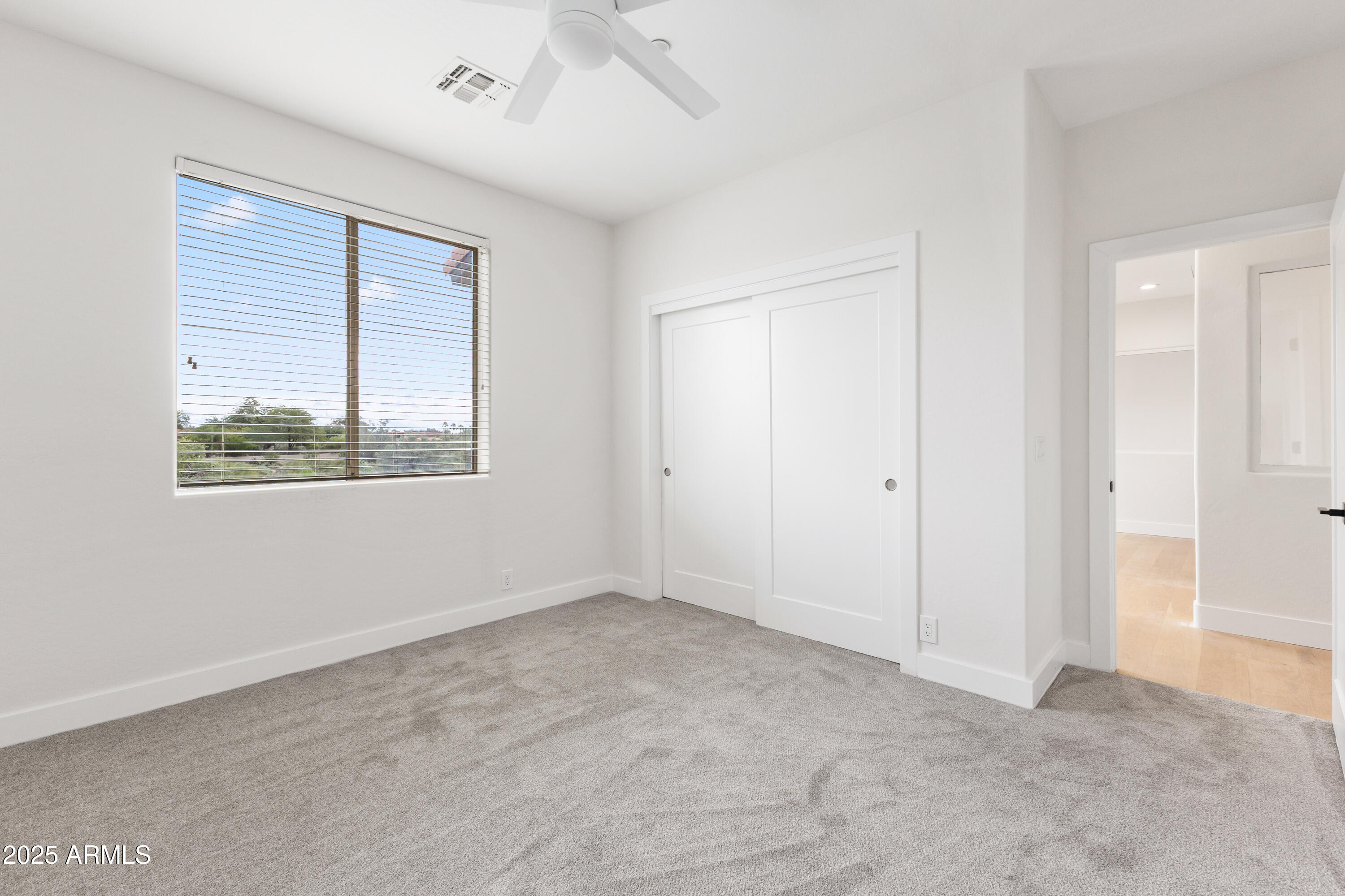 27589 North 61st Place Scottsdale, AZ 85266 - Photo 70 of 89 an empty room with a window