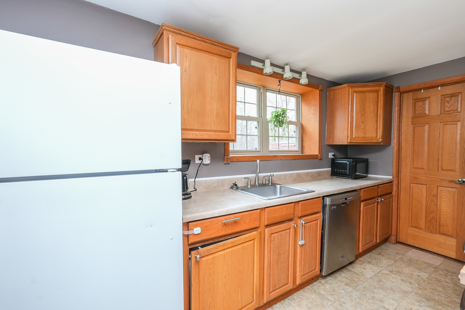 2821 Shadow Road Momence, IL 60954 - Photo 14 of 50 a kitchen with a refrigerator and a sink