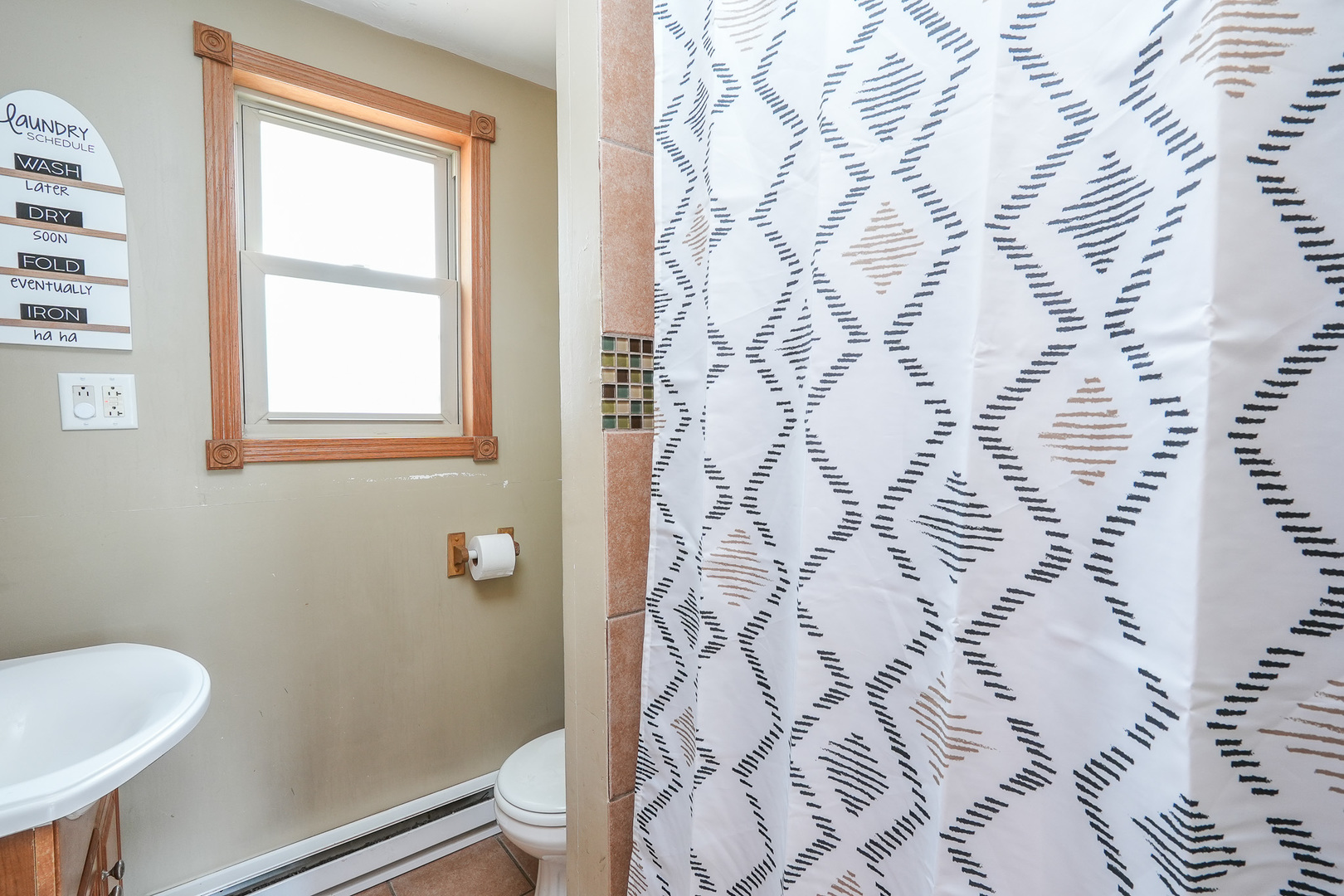 2821 Shadow Road Momence, IL 60954 - Photo 24 of 50 a bathroom with a toilet and a shower curtain