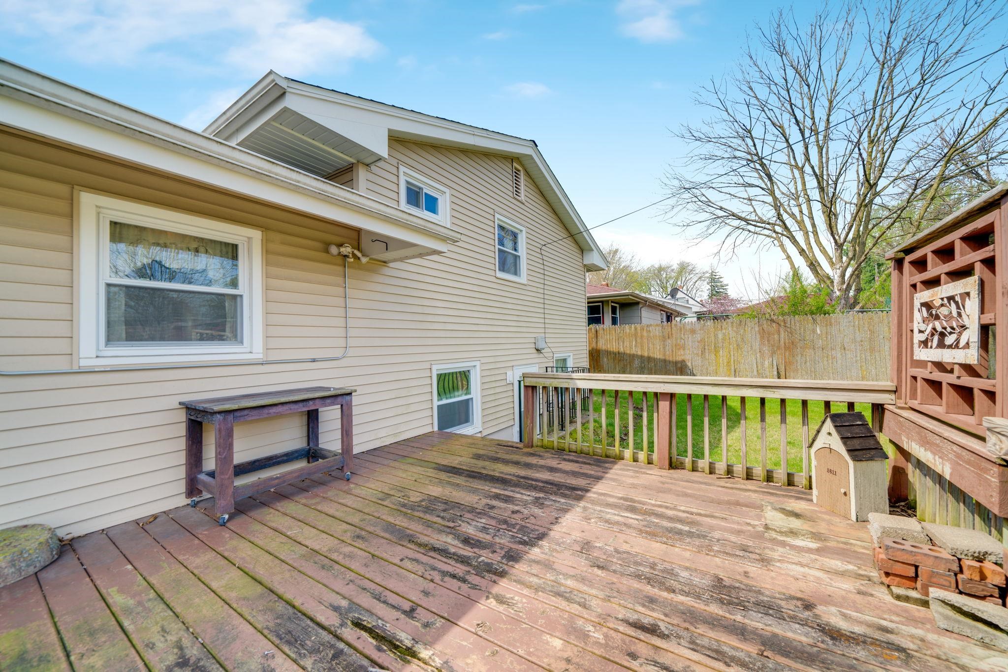 1611 Notre Dame Road Rockford, IL 61103 - Photo 26 of 33 a view of a house with a wooden deck
