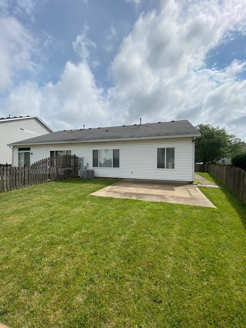 318 Richfield Trail Romeoville, IL 60446 - Photo 9 of 9 a view of a house with a backyard