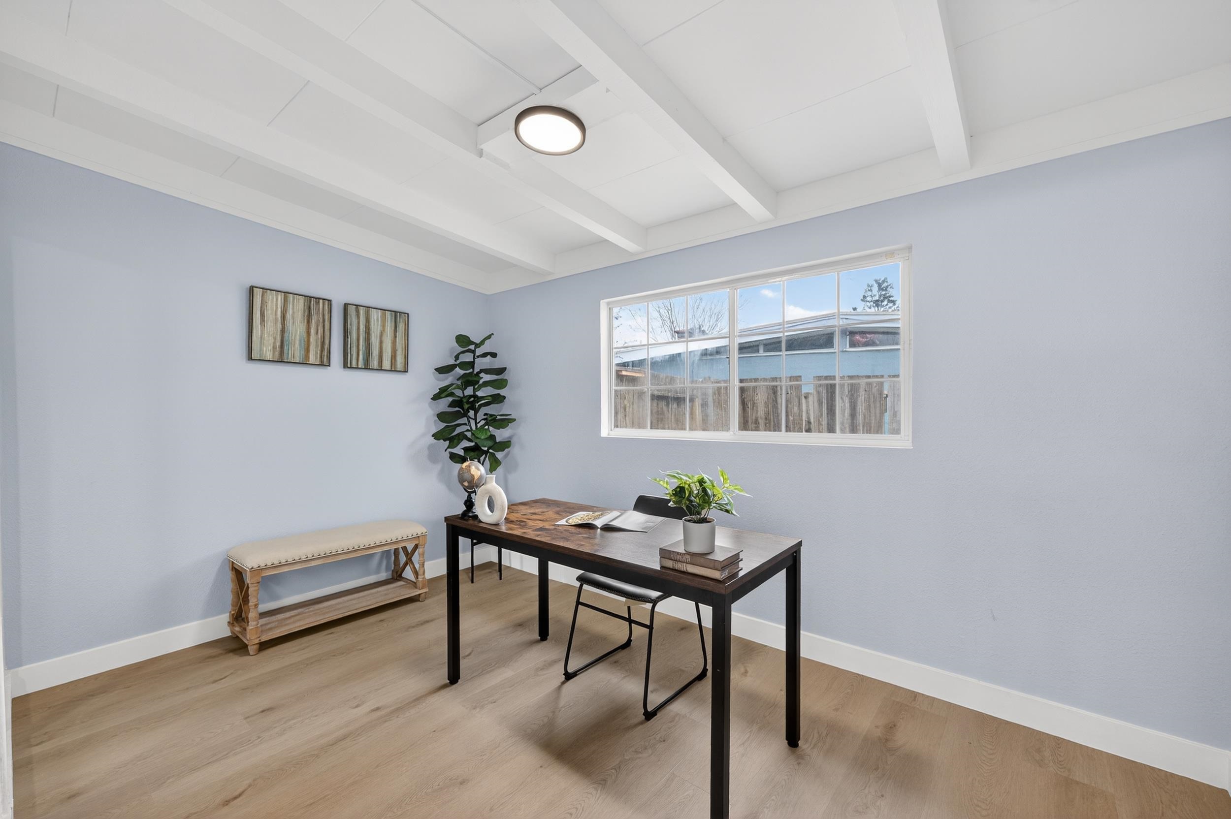 1241 Coronel Avenue Vallejo, CA 94591 - Photo 9 of 11 Home office with light wood-style flooring and beam ceiling
