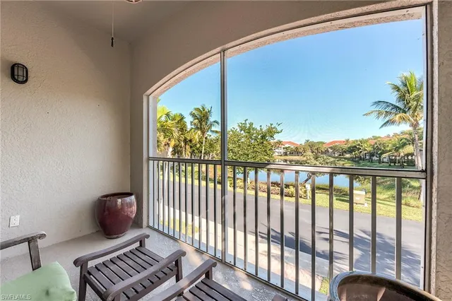a view of a floor to ceiling window with wooden floor