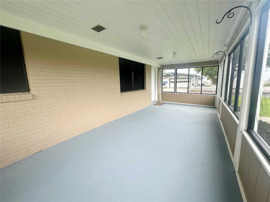 130 Bay Ridge Drive Baytown, TX 77523 - Photo 4 of 20 a view of an empty room with a flat screen tv