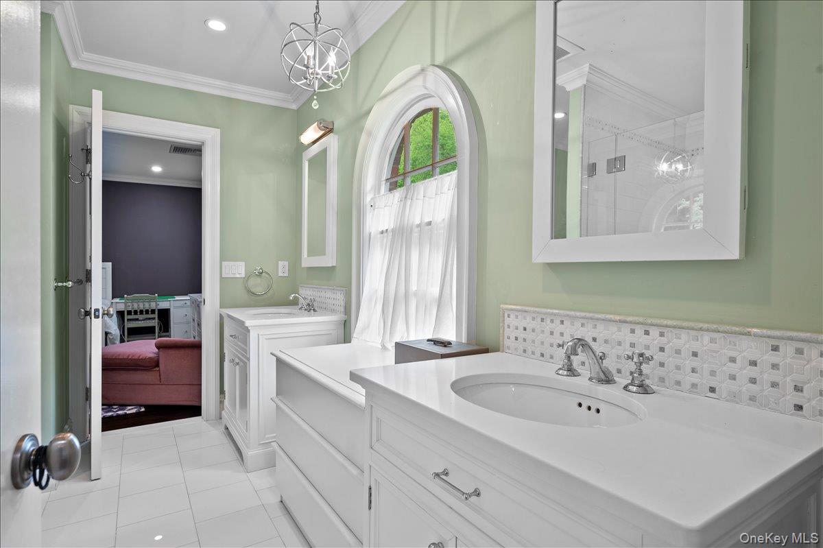 7 Harcourt Road Scarsdale, NY 10583 - Photo 21 of 34 a spacious bathroom with a sink double vanity
