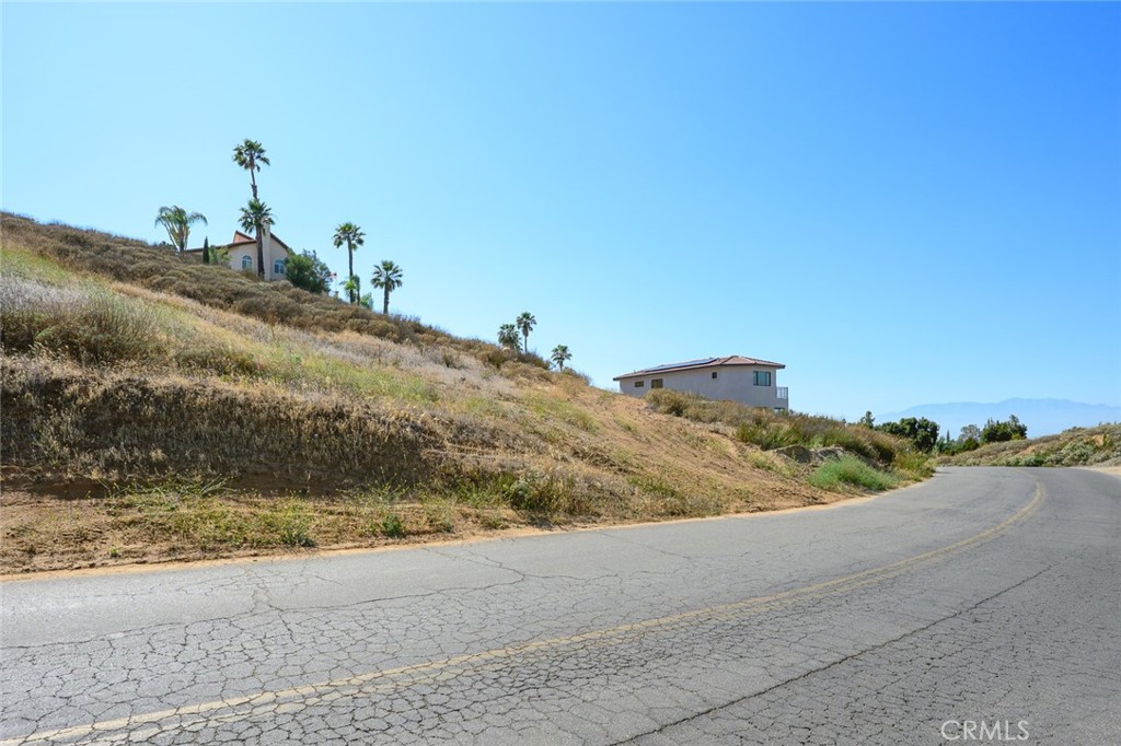 16527 Canyon Ridge Drive Riverside, CA 92503 - Photo 3 of 13 a view of a beach and a mountain view