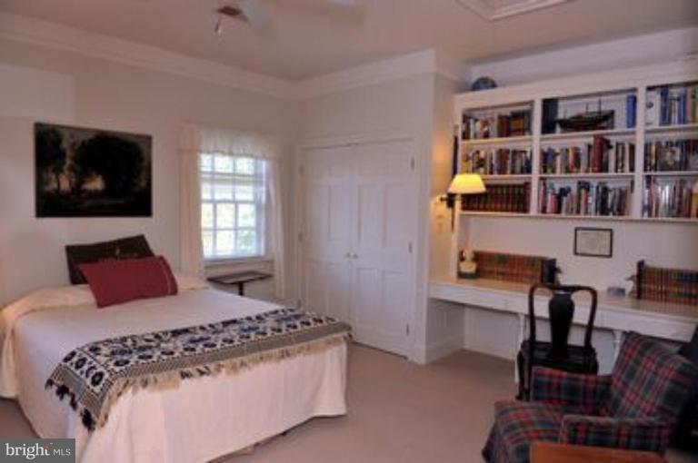 3032 Bull Run Mountain Road The Plains, VA 20198 - Photo 12 of 16 a bedroom with a bed and a bookshelf